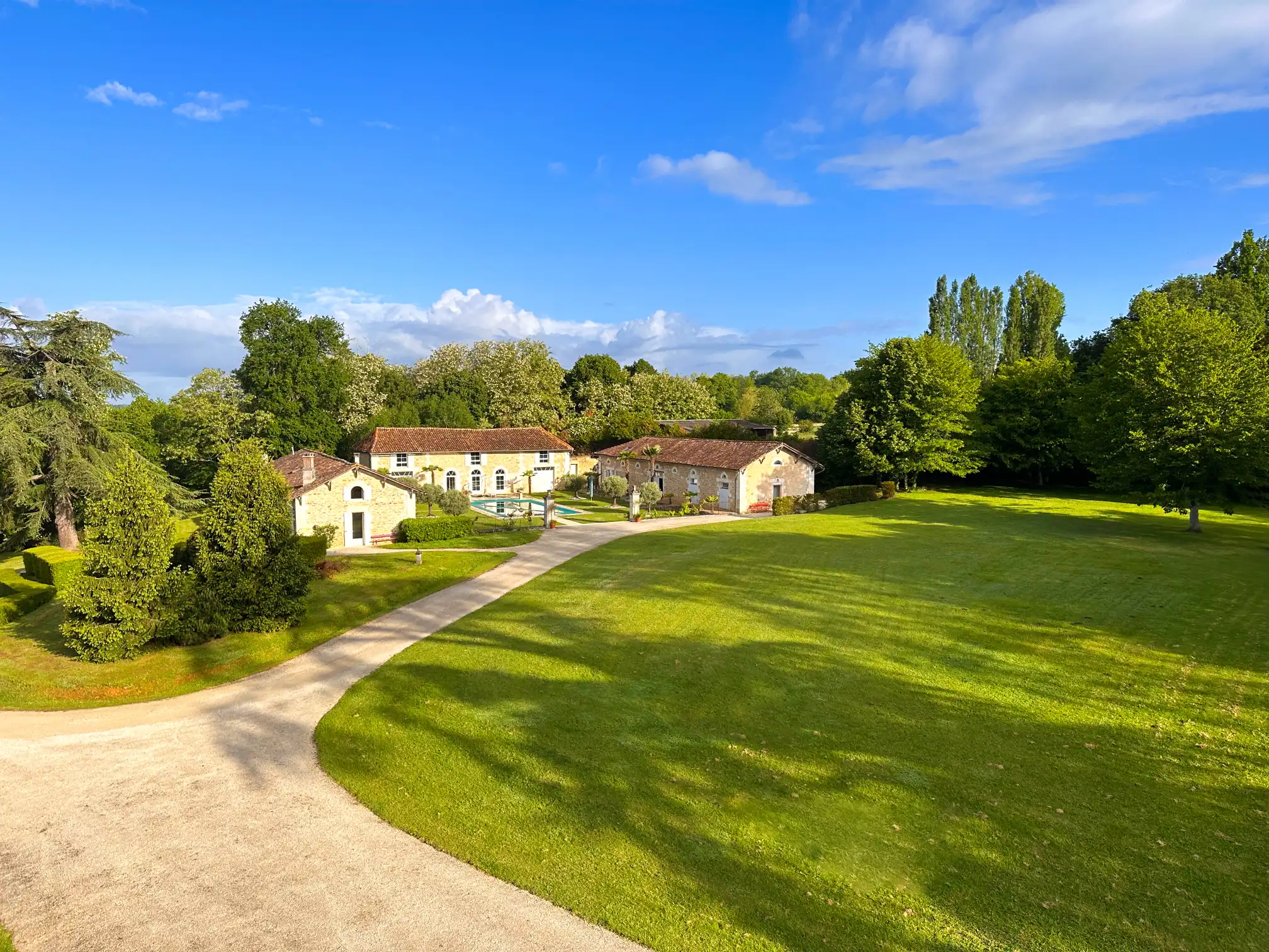 Curved pathway to a country house