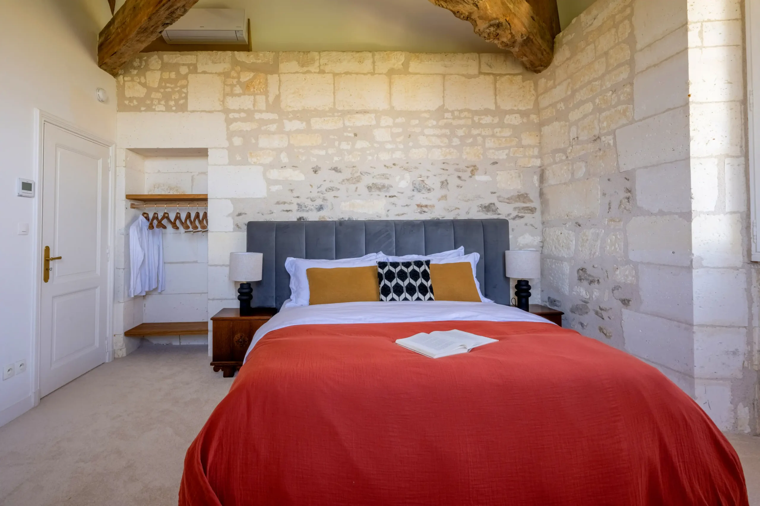 Bright bedroom with garden and countryside views from large windows