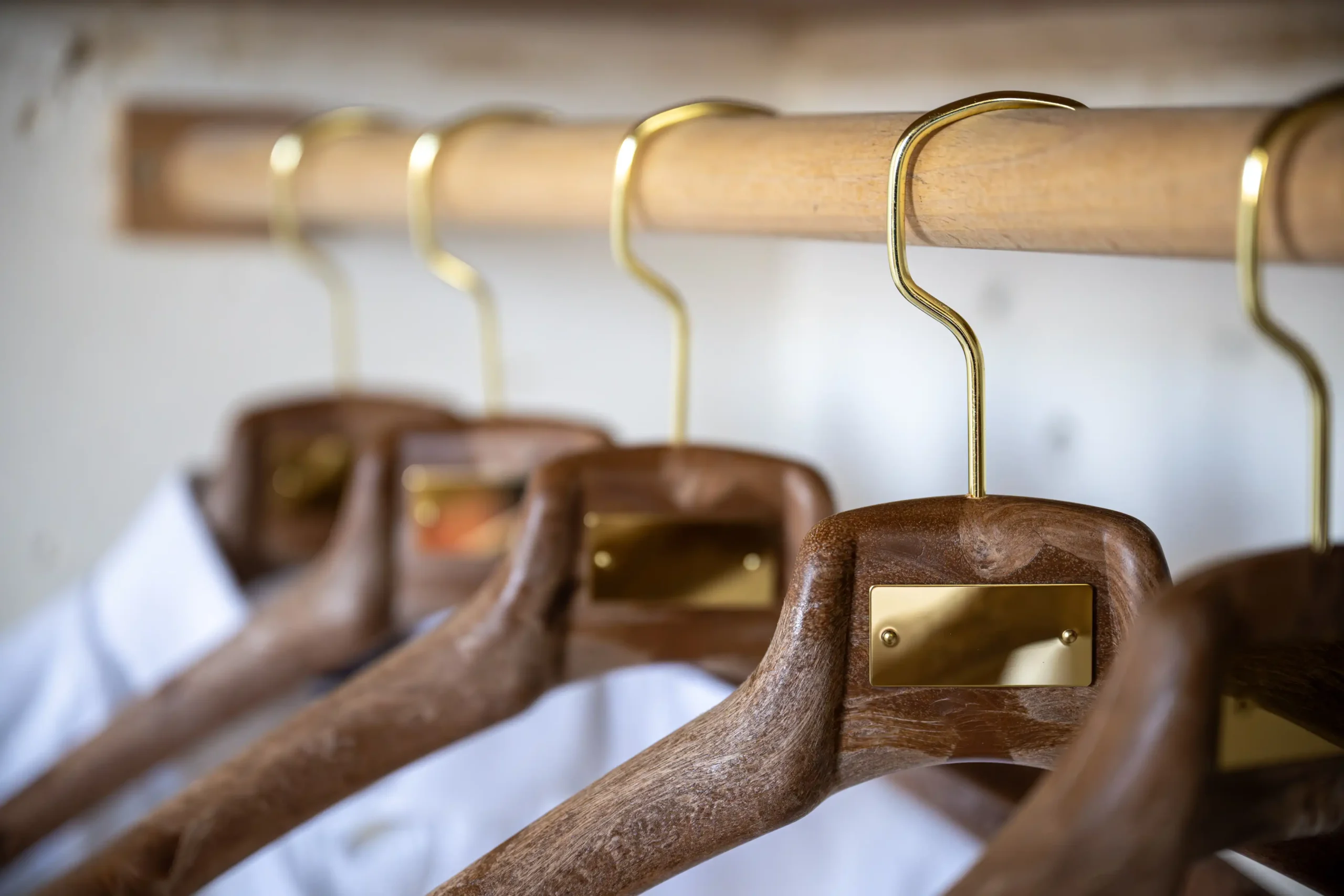 Cozy workspace with a wooden desk, chair, and antique decor.