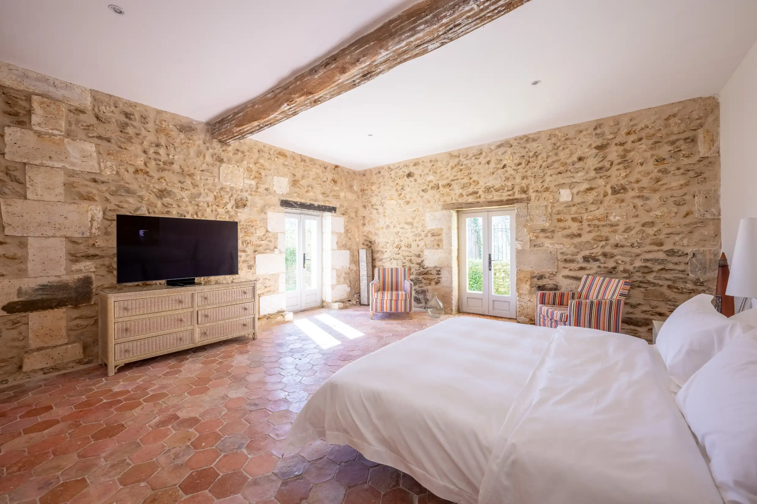 Garden access from Pool Gite suite for outdoor relaxation