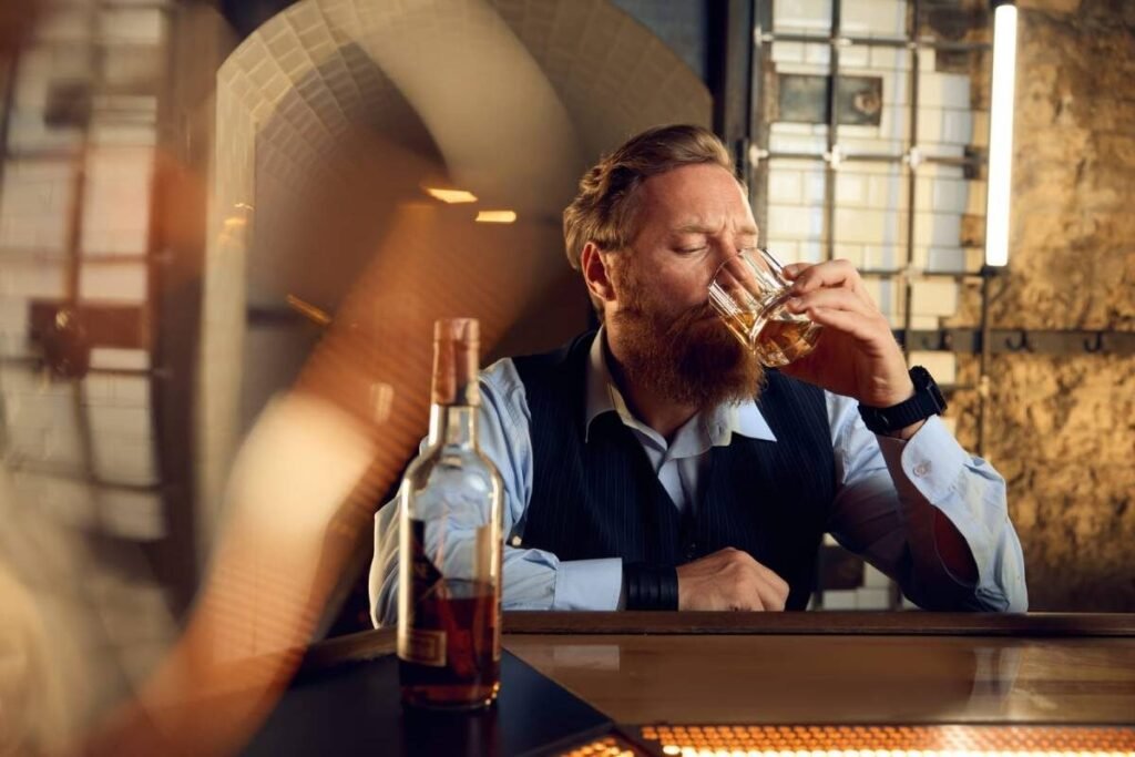 man drinking cognac